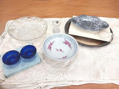 VARIETY OF BOWLS-CANDLE HOLDERS AND LACE LIKE TABLECLOTH