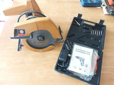 CORDLESS SCREWDRIVER IN CARRY CASEAND BLACK & DECKER 7 1/4" CIRCULAR SAW