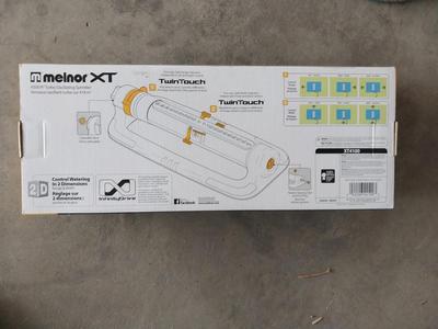 NEW IN BOX TURBO OSCILLATING SPRINKLER AND LAWN CARE