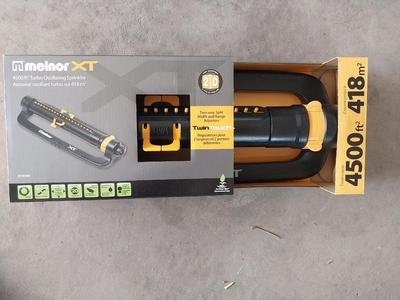 NEW IN BOX TURBO OSCILLATING SPRINKLER AND LAWN CARE