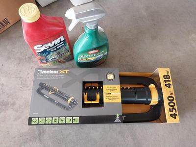 NEW IN BOX TURBO OSCILLATING SPRINKLER AND LAWN CARE