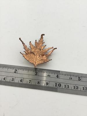 Gold tone fashion leaf vintage pin