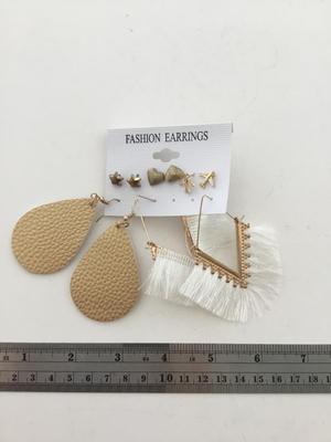 Gold tone set of fashion earrings