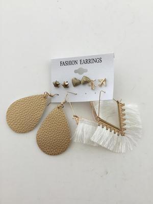Gold tone set of fashion earrings