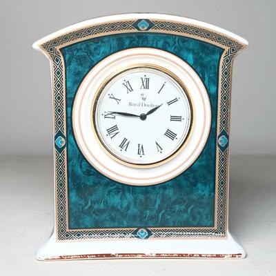 LOT 47: Pair of Roseville Pottery Blue Silhouette Candleholders with Royal Doulton Biltmore Miniature Mantel Clock