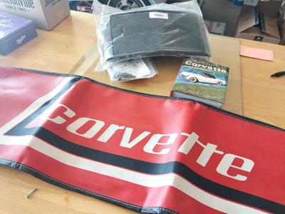 CORVETTE LICENSE PLATE HOLDER-BRA- HARDBACK BOOK