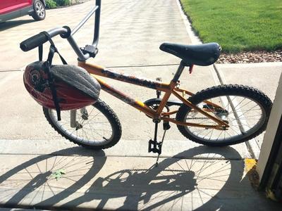 KIDS BIKE WITH TOUGH TIRES AND BIKE HELMENT
