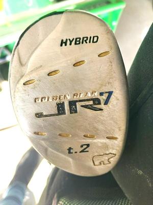 GOLF BAG WITH A FEW CLUBS BY JR