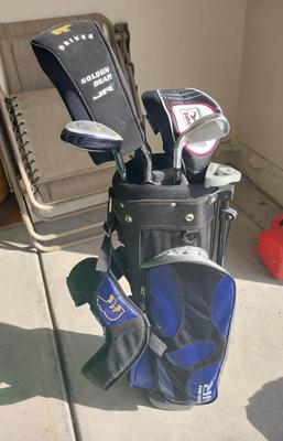 GOLF BAG WITH A FEW CLUBS BY JR