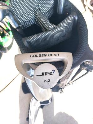 GOLF BAG WITH A FEW CLUBS BY JR