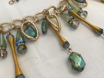 Beautiful Crystal And coil Gold Statement Necklace