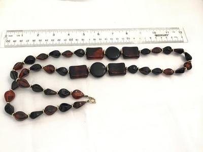 Amber Tone Tortoise Colored Black Faux Bead with Gold Tone Dpacers