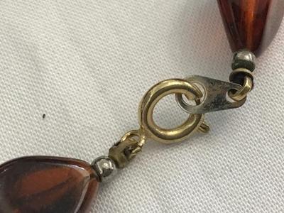 Amber Tone Tortoise Colored Black Faux Bead with Gold Tone Dpacers