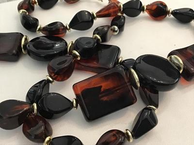 Amber Tone Tortoise Colored Black Faux Bead with Gold Tone Dpacers