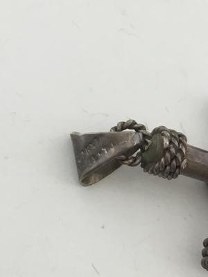 Marked cross necklace pendant