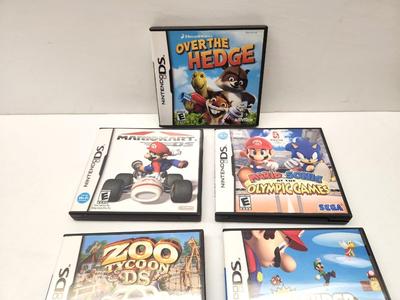 Lot #14 Vintage Nintendo - Lot of 7 Games with book