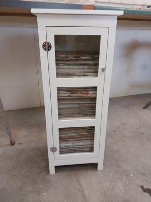 THREE SHELF CABINET FILLED WITH WOODWORK BOOKS