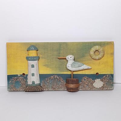 LOT 271: Watercolor by LiLo, Wood Art 'Lighthouse and Seagull', Shadow Box Containing Shells & More