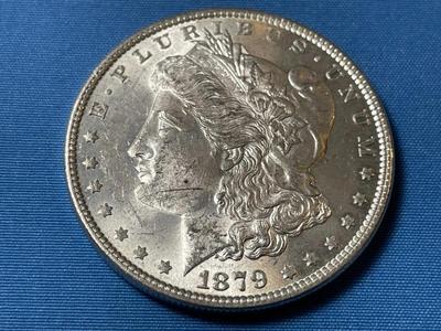 1879-P UNCIRCULATED CONDITION MORGAN SILVER DOLLAR (COIN #28).