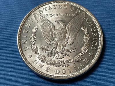 1879-P UNCIRCULATED CONDITION MORGAN SILVER DOLLAR (COIN #28).