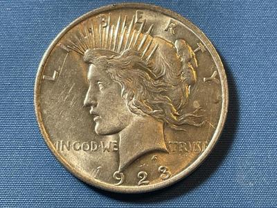 1923-P EXTRA FINE/AU CONDITION PEACE SILVER DOLLAR AS PICTURED.