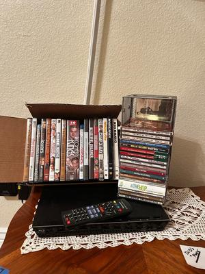 PANASONIC BLU-RAY DISC PLAYER W/REMOTE, DVD’S AND A VARIETY OF MUSIC ON CD’S