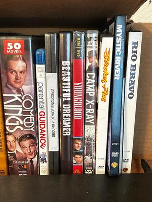 PANASONIC BLU-RAY DISC PLAYER W/REMOTE, DVD’S AND A VARIETY OF MUSIC ON CD’S