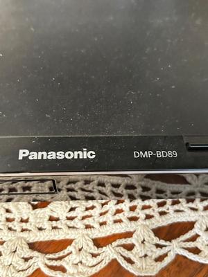 PANASONIC BLU-RAY DISC PLAYER W/REMOTE, DVD’S AND A VARIETY OF MUSIC ON CD’S
