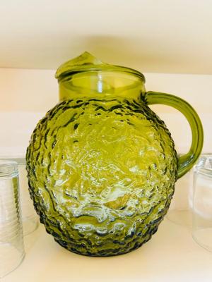 A VARIETY OF DRINKING VESSEL’S WITH PITCHERS