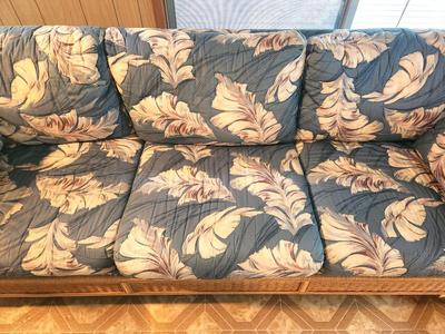Lot #48 Vintage Rattan Sofa - floral pattern