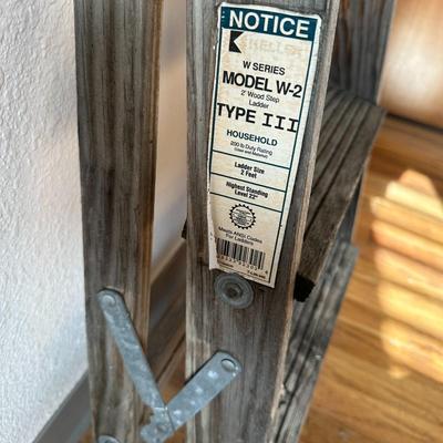 Sale Photo Thumbnail #684: 2 step ladders.  1 small wood and one stable metal.