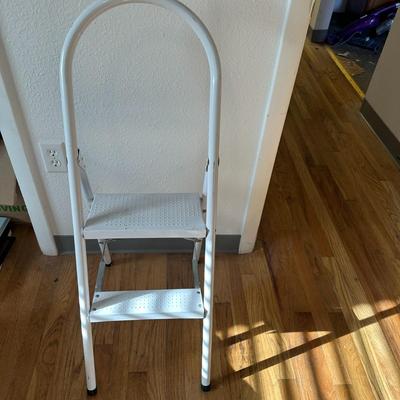 Sale Photo Thumbnail #687: 2 step ladders.  1 small wood and one stable metal.