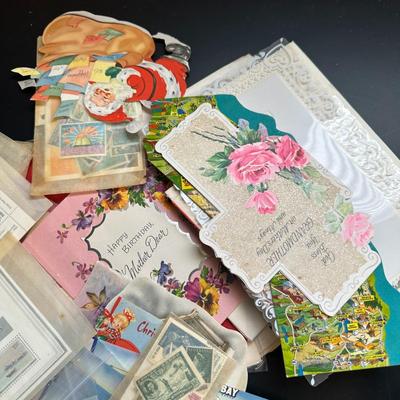 Sale Photo Thumbnail #704: These are unsold vintage to antique items that did not sell or were not picked up in other auctions.  Contains everything from collectible stamps to greeting cards to ads and maps.  Think of it as a grab bag.