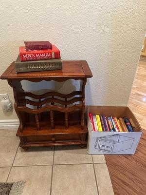 MAGAZINE /BOOK RACK TABLE AND A VARIETY BOX OF BOOKS