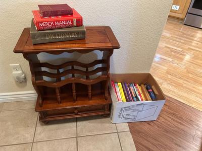 MAGAZINE /BOOK RACK TABLE AND A VARIETY BOX OF BOOKS