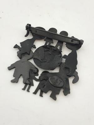 K and T. Marked fashion brooch