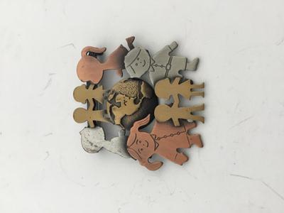 K and T. Marked fashion brooch