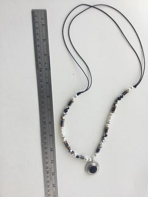 Beautiful unique beaded cord type necklace
