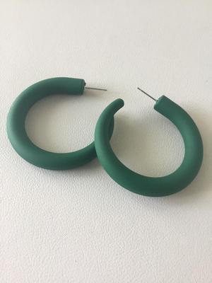 Green statement hoop earrings