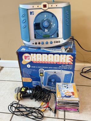 LOT 144W: MTV Karaoke Machine w/ Box, 2 Microphones & CDs