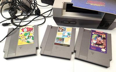 Lot #77 Nintendo Game Station with 3 games, 2 controllers