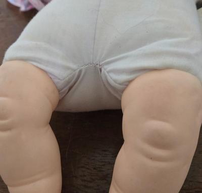 LOT 113: Vintage Horsman Baby Doll, Playmates Doll, Eugene Doll, and More