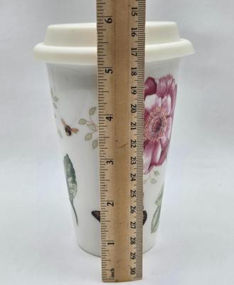 LOT 119: Teleflora Cup and Saucer, Glass Heart, Thomas Kinkade Sleigh Ride, Lenox Butterfly Meadow Travel Mug, and More