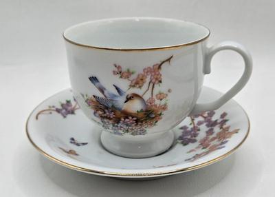 LOT 119: Teleflora Cup and Saucer, Glass Heart, Thomas Kinkade Sleigh Ride, Lenox Butterfly Meadow Travel Mug, and More