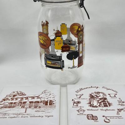 LOT 125: Bicentennial Placemats and Napkins, ARC France Glass Cannister, Hull Pottery Alpine Pretzel Jar, and More