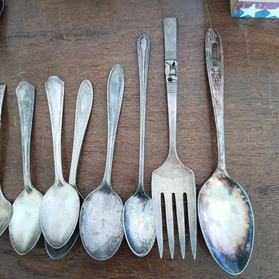 LOT 158: Unique Glass Colbalt Blue Beverage Stirrers Flatware, Vintage Souvenir Spoons, Vintage Folk Art Uncle Sam Tin Metal Shelf Sitter...