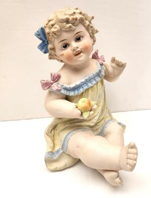 Lot #107 Antique bisque china Piano Baby