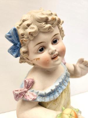 Lot #107 Antique bisque china Piano Baby