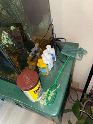 Sale Photo Thumbnail #703: U103Aquarium w/fish + cabinet and contents
