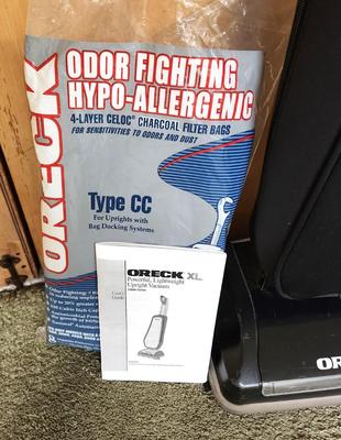 Lot #130 Oreck XL Lightweight Vacuum Cleaner with Bags
